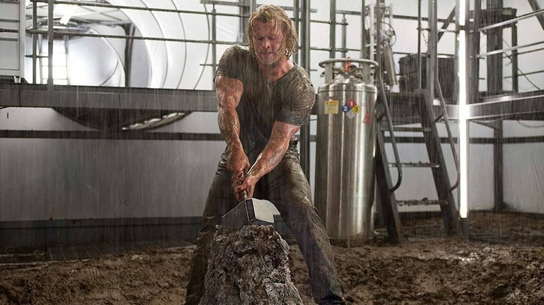 Thor pulling hammer