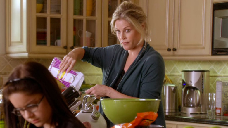 Claire in kitchen, cooking