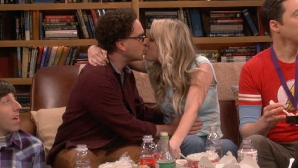 Johnny Galecki as Leonard kisses Kaley Cuoco as Penny in The Big Bang Theory