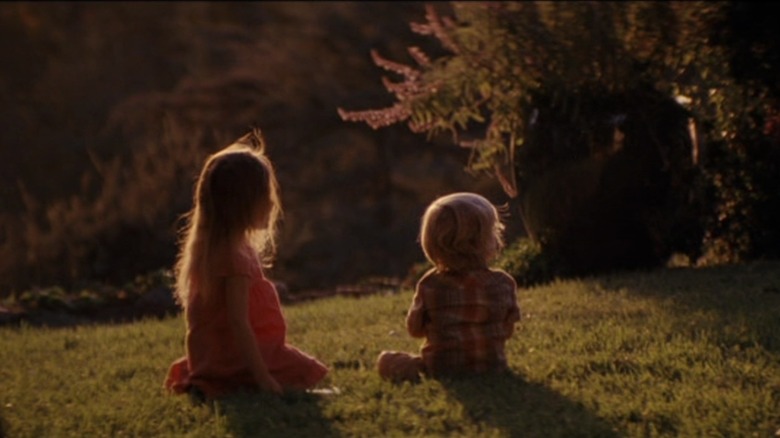 Cobbs children playing outside