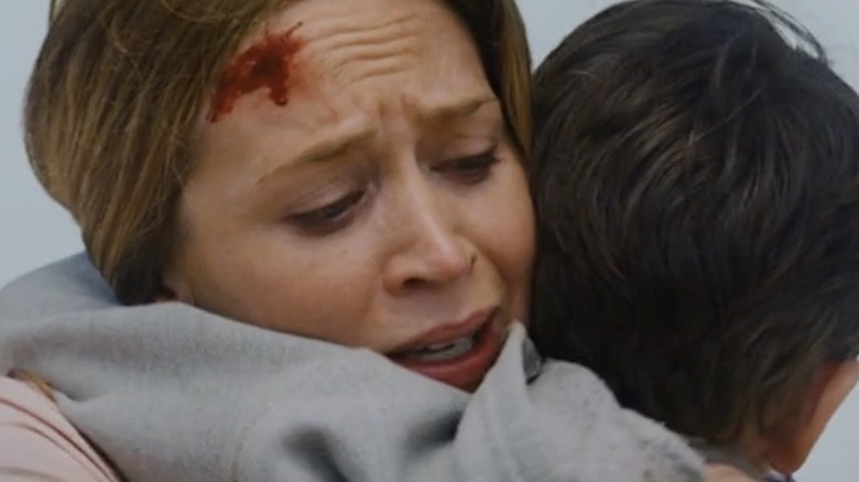 Emily Blunt hugs Pierce Gagnon