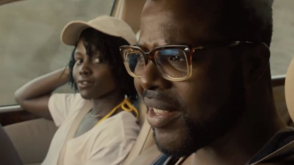 Lupita Nyong'o and Winston Duke in Us