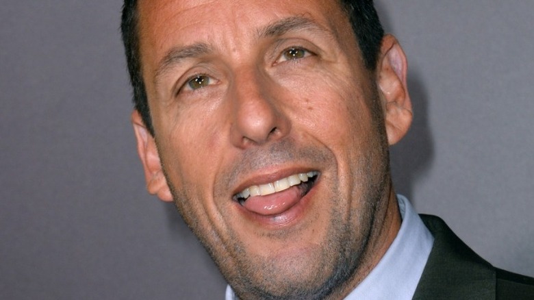 Adam Sandler dons goofy grin