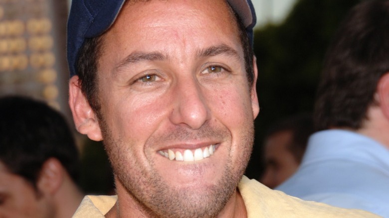 Adam Sandler smiles