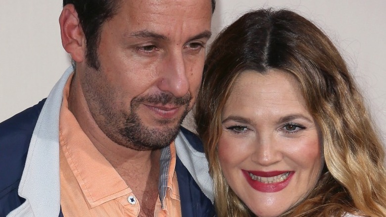 Adam Sandler and Drew Barrymore pose 