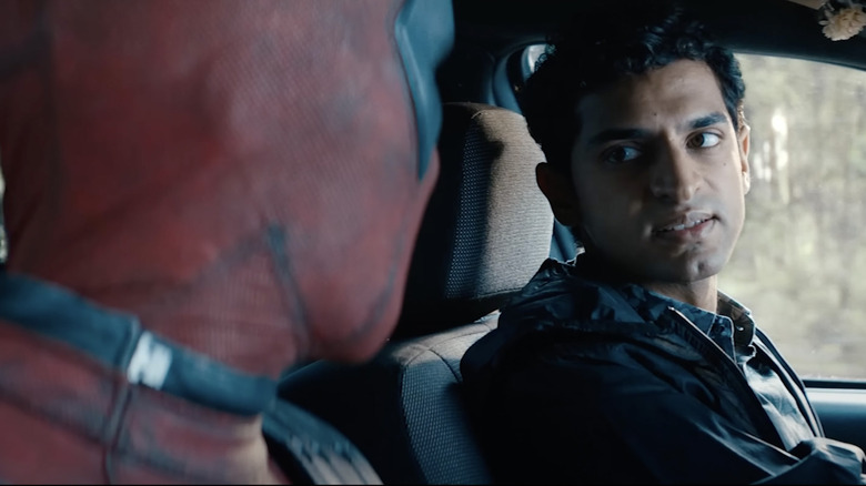 Dopinder and Deadpool in vehicle