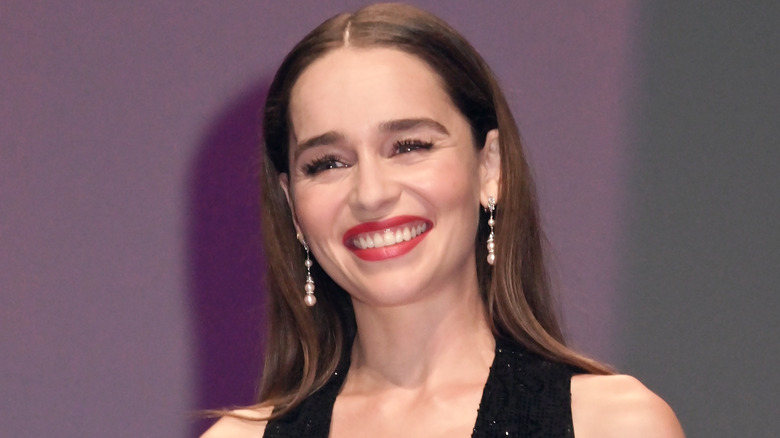 Emilia Clarke smiling at an event