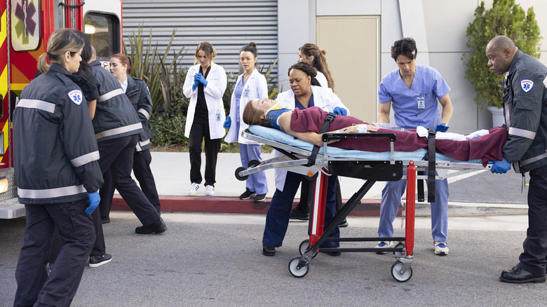 Dr. Addison Mongomery getting loaded into an ambulance in the single-take opening scene of the episode