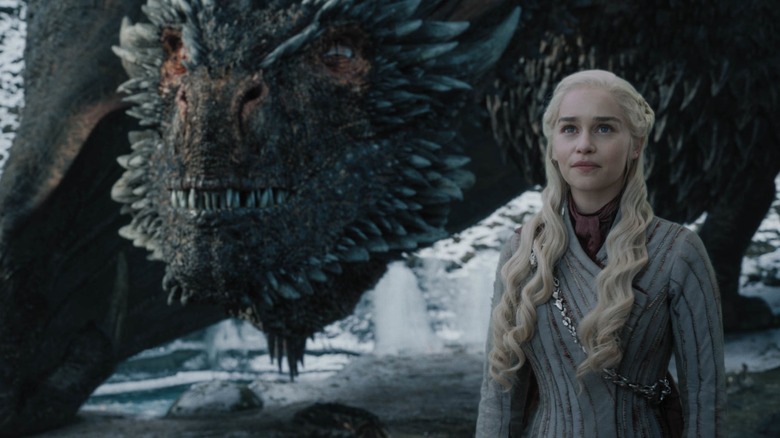 Daenerys smiling with Drogon