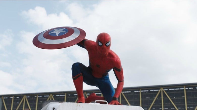 Spider-Man holding Captain America's shield