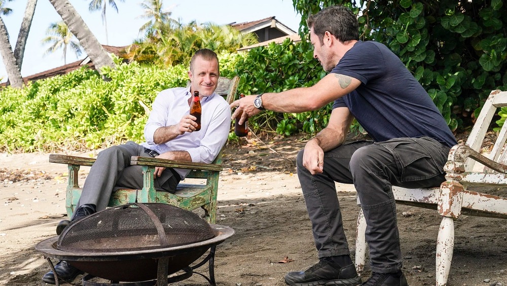 Danno and McGarrett sitting on chairs