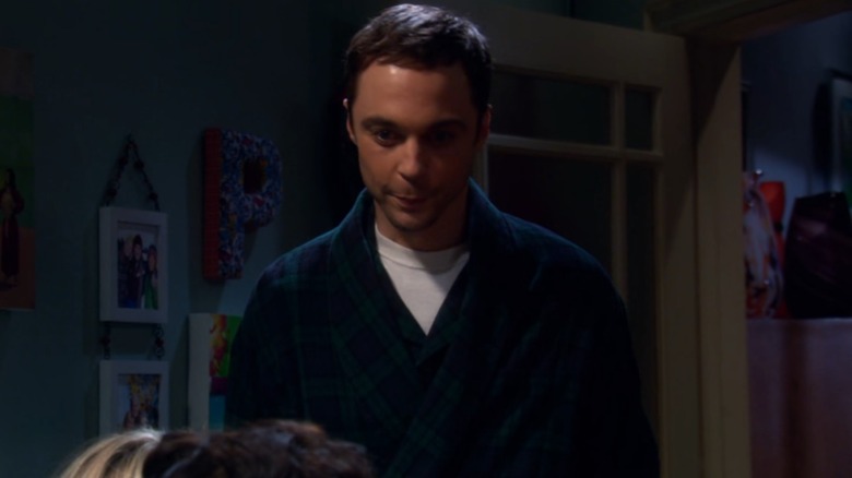 Sheldon standing in Penny's room