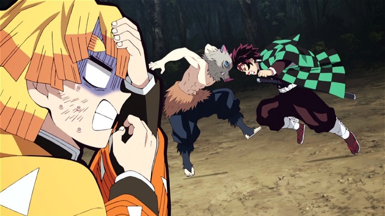 Tanjiro fighting Inosuke