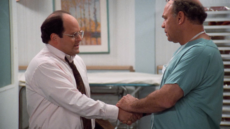 George shaking hands with Doctor Wexler