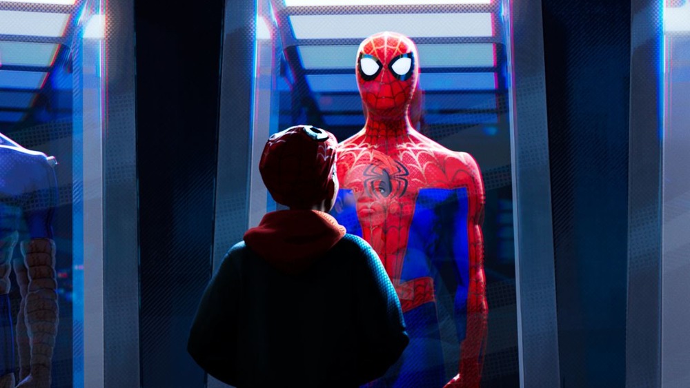 Miles Morales looks up to Spider-Man in Into the Spider-Verse