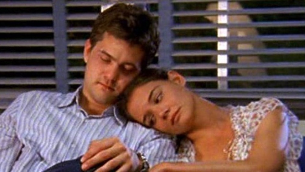 Pacey and Joey cuddle