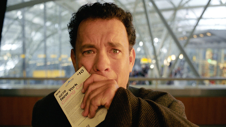 Tom Hanks covering mouth 