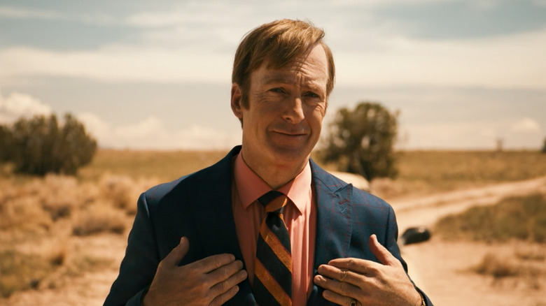 Bob Odenkirk Saul Goodman Better Call Saul in desert in suit smiling