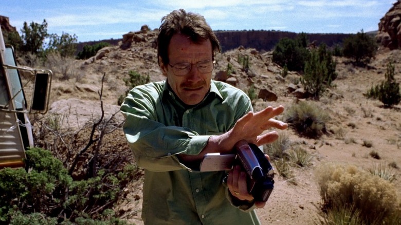 Walter White holding a camera