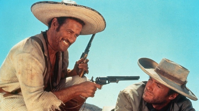 Tuco holding a gun on Blondie in The Good, the Bad, and the Ugly