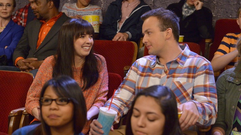 Nora and Gibby at a movie theater