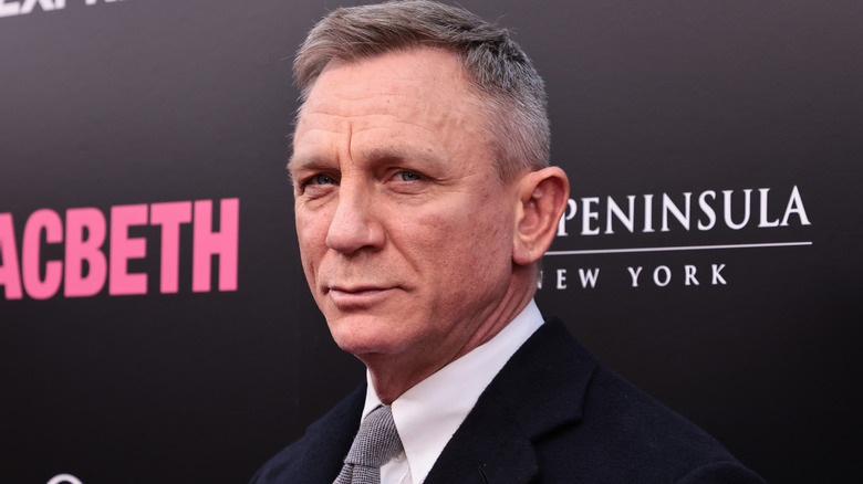 Daniel Craig looking into camera