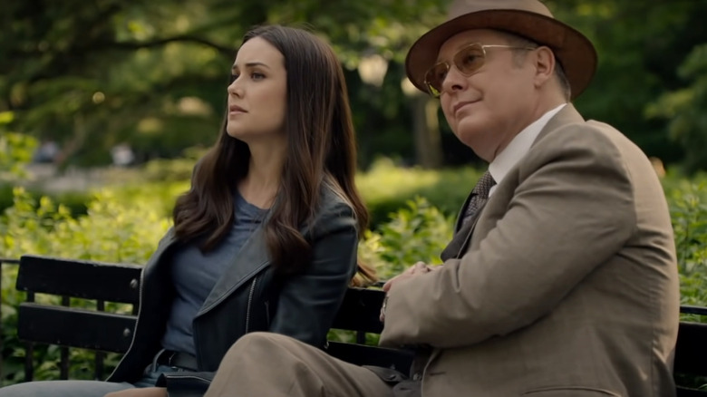  Liz and Reddington sit together