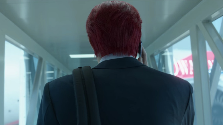 Gi-hun with red hair from the back