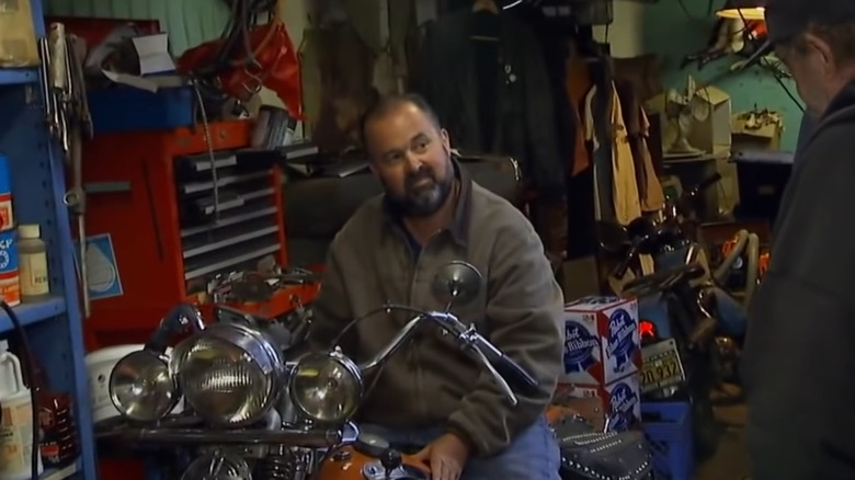 Frank Fritz sits on a motorcycle