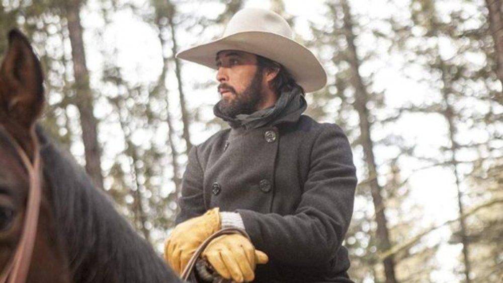 Walker (Ryan Bingham) rides a horse on Yellowstone