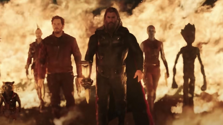 Thor and the Guardians walking through fire