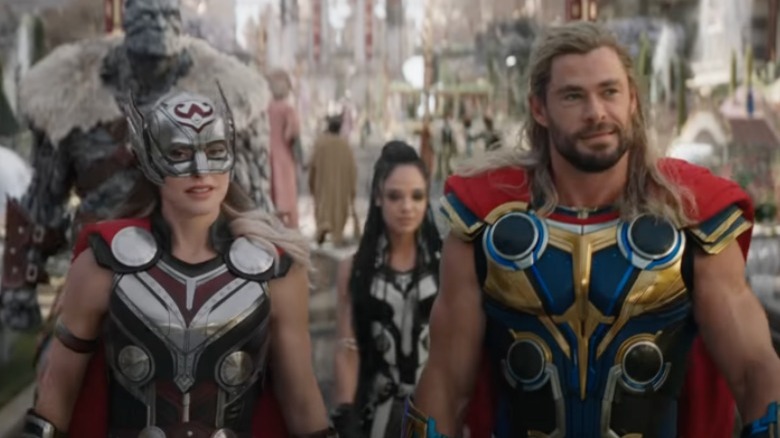 Thor, Jane Foster, King Valkyrie, and Korg walking