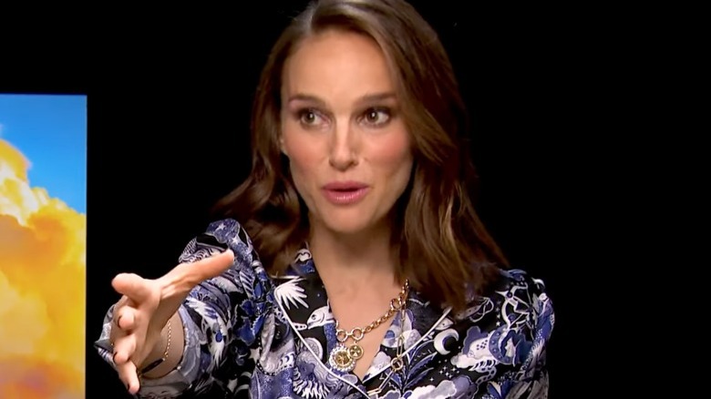 Natalie Portman miming throwing hammer