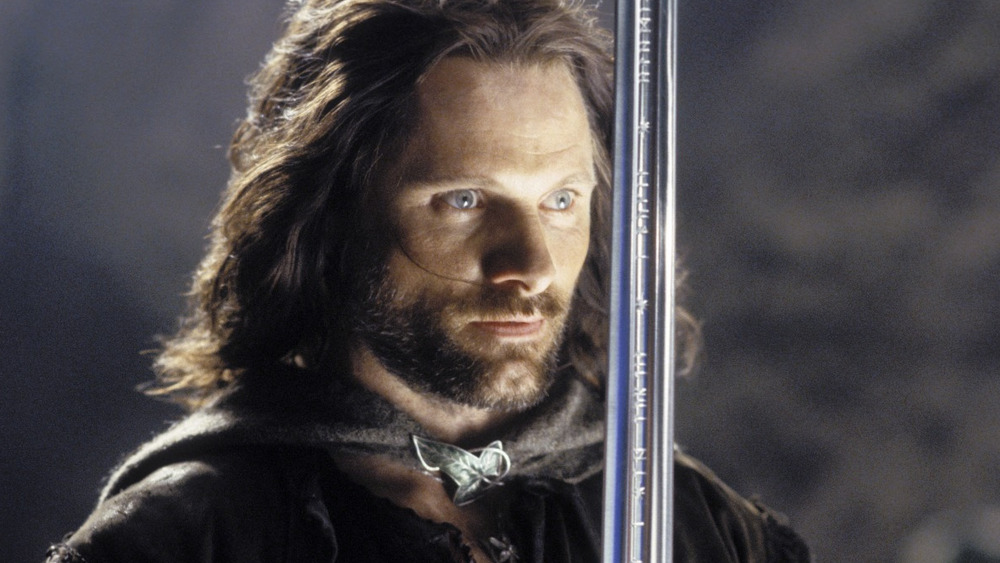 Aragorn holding sword