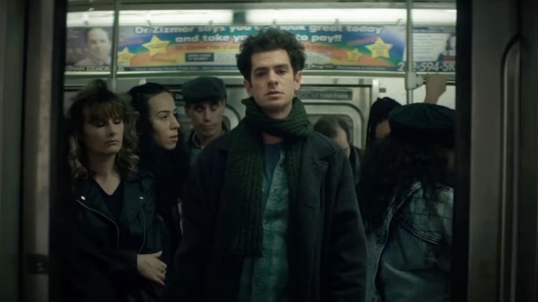 Jon on a crowded subway train