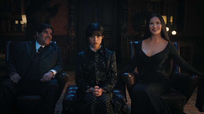 The Addams family sitting