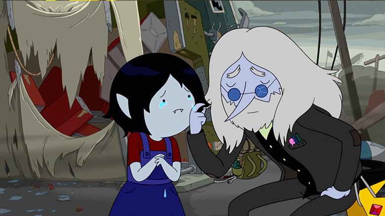 Simon comforts a young Marcy