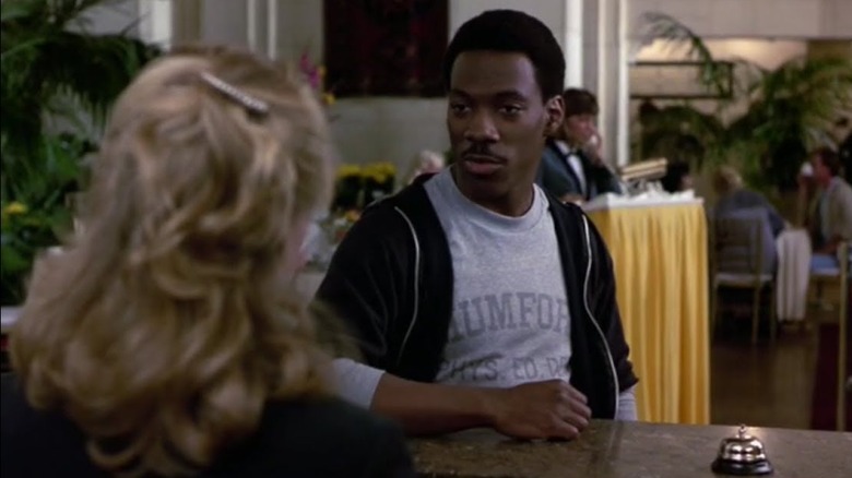 Axel Foley at the reception desk