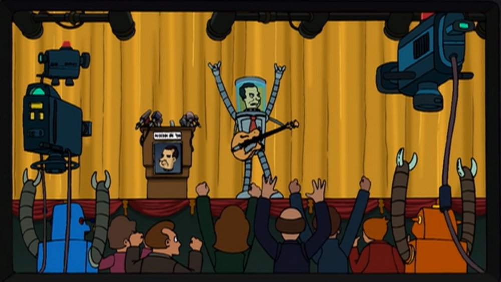 Richard Nixon's head on Bender's body on stage while in front of an audience and floating drone cameras in "Futurama"