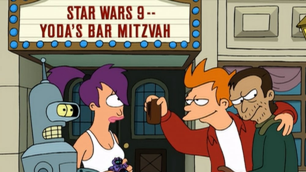 Bender, Leela, Fry, and a mugger in front of a movie theater in "Futurama"