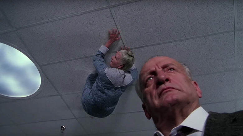 George C Scott with woman on ceiling 