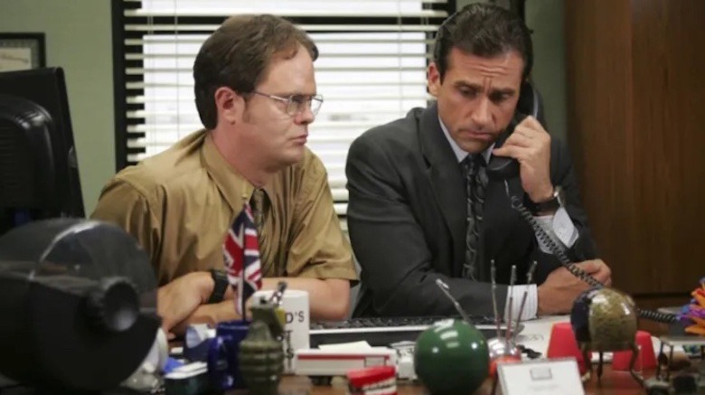 Michael at desk with Dwight