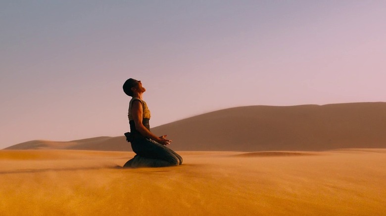 Furiosa (Charlize Theron) roars into the desert in "Mad Max: Fury Road"