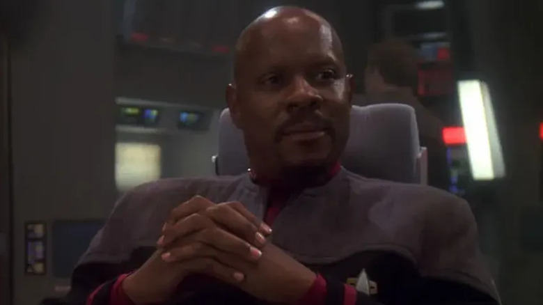 Sisko sits on the bridge