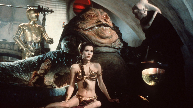 Carrie Fisher imprisoned in front of Jabba Star Wars