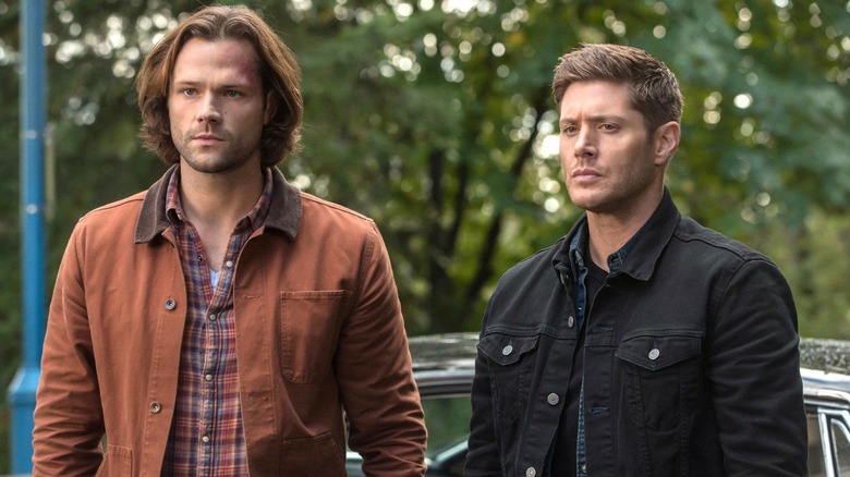 Dean and Sam scowling