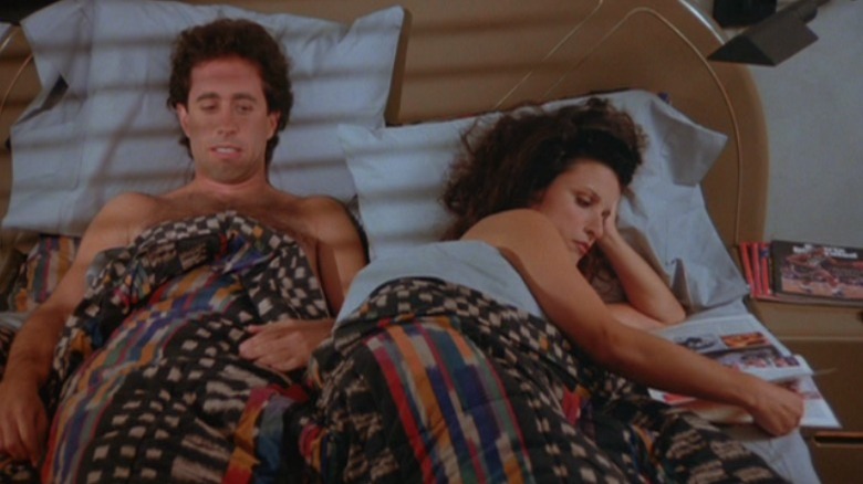 Jerry and Elaine lay in bed