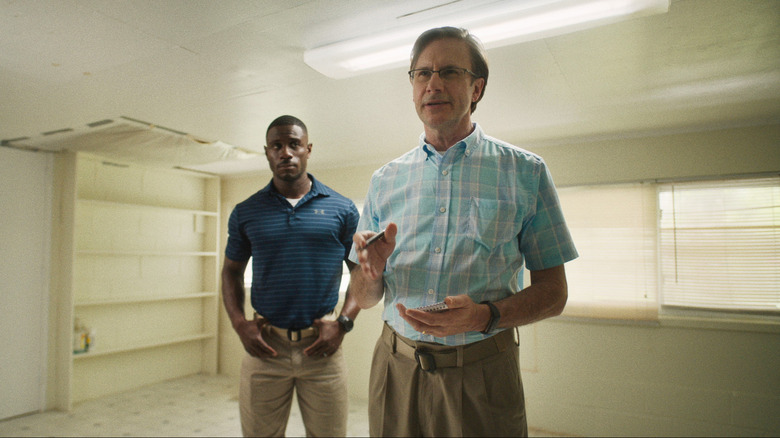 Marchánt Davis and Josh Hamilton standing in room