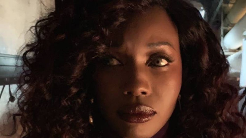 Anna Diop poses with Starfire's new look on Titans