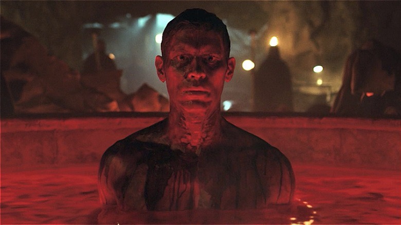 Sebastian emerging from a pool of blood